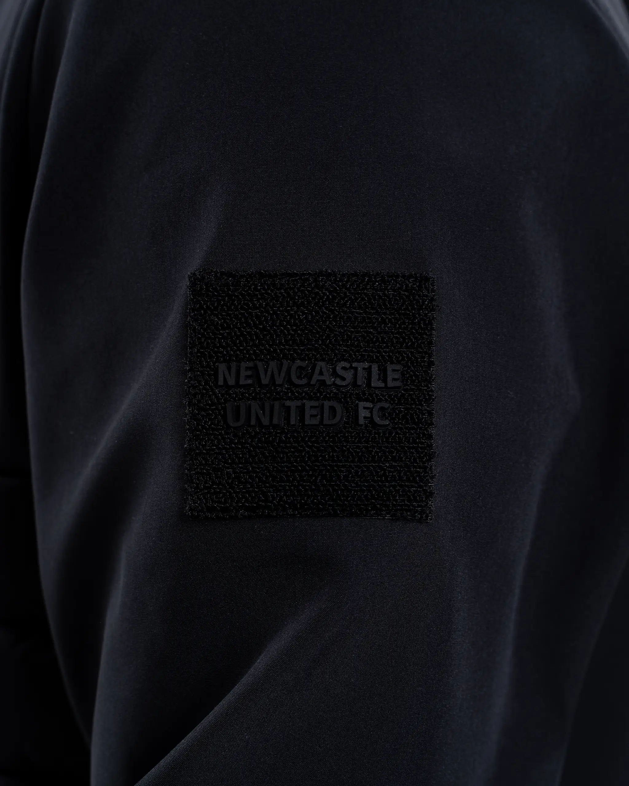 Newcastle United Black Hooded Hybrid Jacket - Image 7
