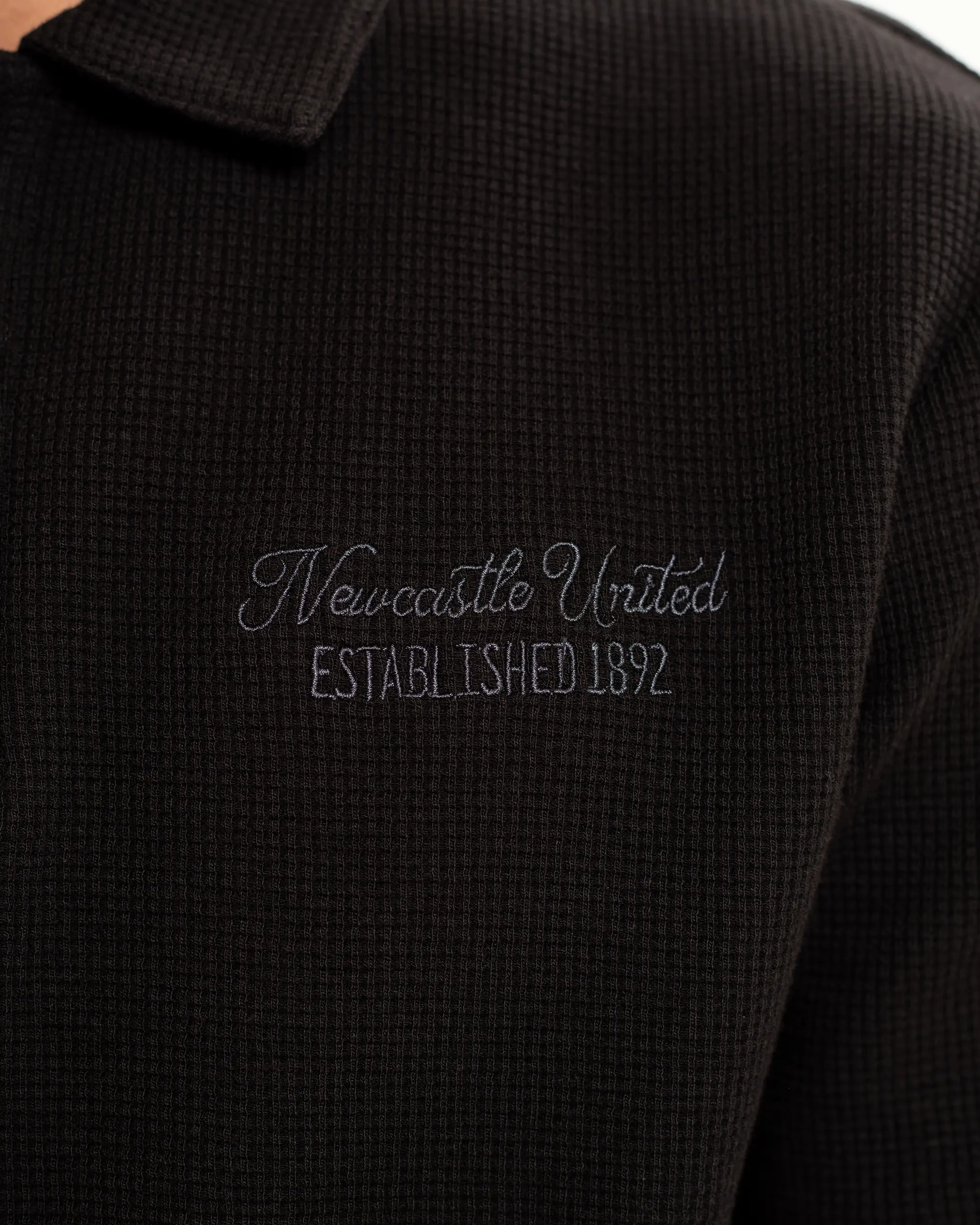 Newcastle United Men's Black Waffle Open Neck Polo Shirt - Image 3