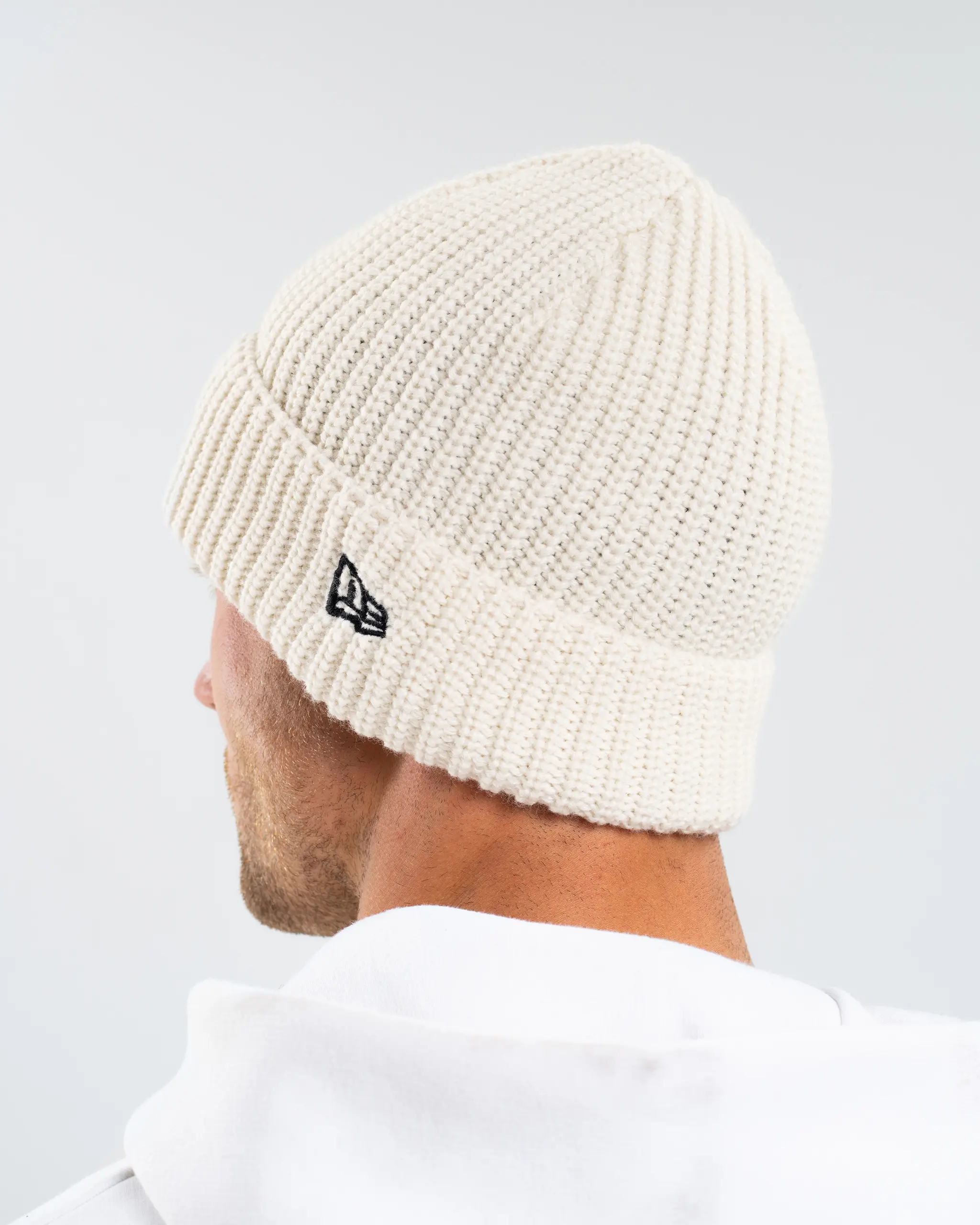 Newcastle United New Era Beige Woven Label Beanie - Image 3